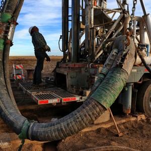 Hydro Resources, a well-drilling contractor, works around the clock to punch new holes in the Ogallala Aquifer in Kansas. The Ogallala, the primary water source in the Great Plains, is declining because billions of gallons are pumped out each year to irrigate corn, soybeans, wheat, and cotton.